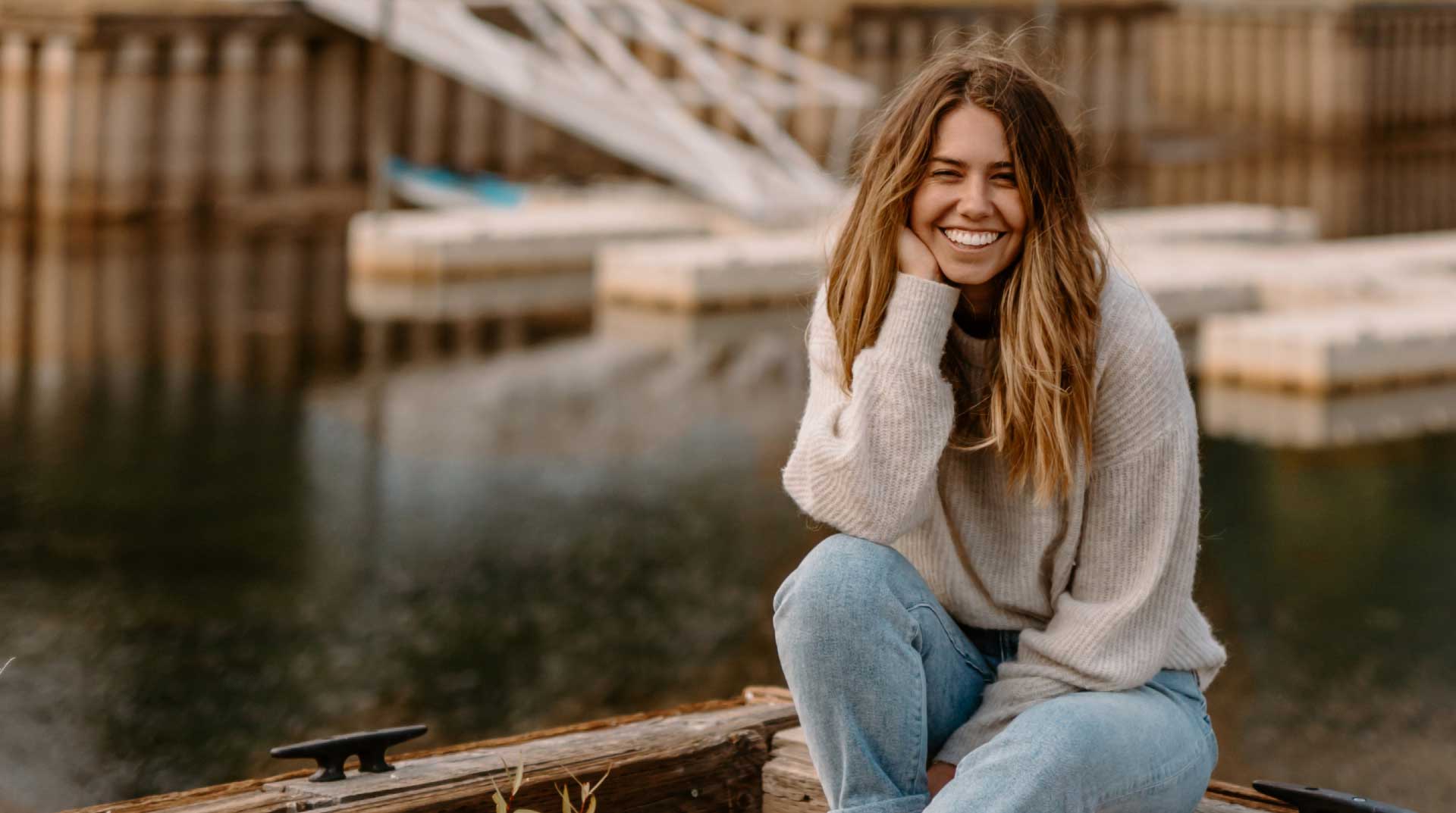 lady smiling on a blurred background